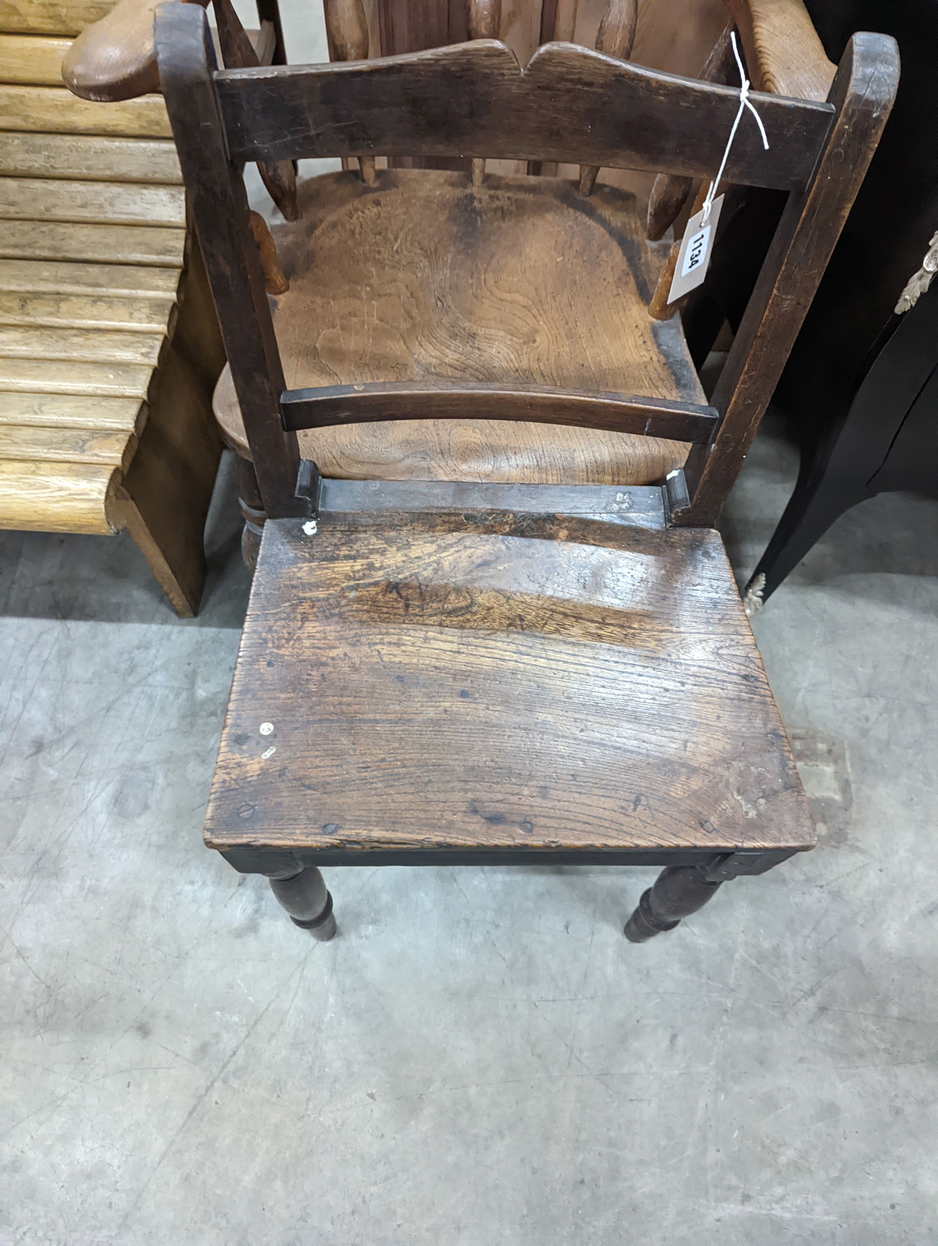 A Victorian elm and beech smoker's bow chair together with a provincial wood seat chair